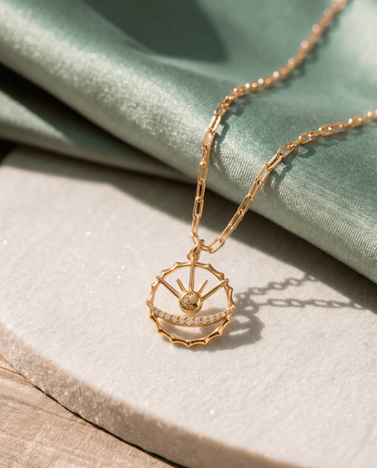 Faceted crystal details on the gold plated Azulique Amulet Necklace