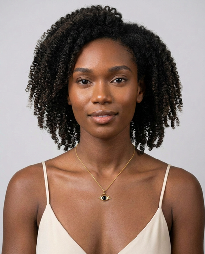 Woman wearing black obsidian pendant necklace with 18k gold-plated finish, Selva Line by Azulique.
