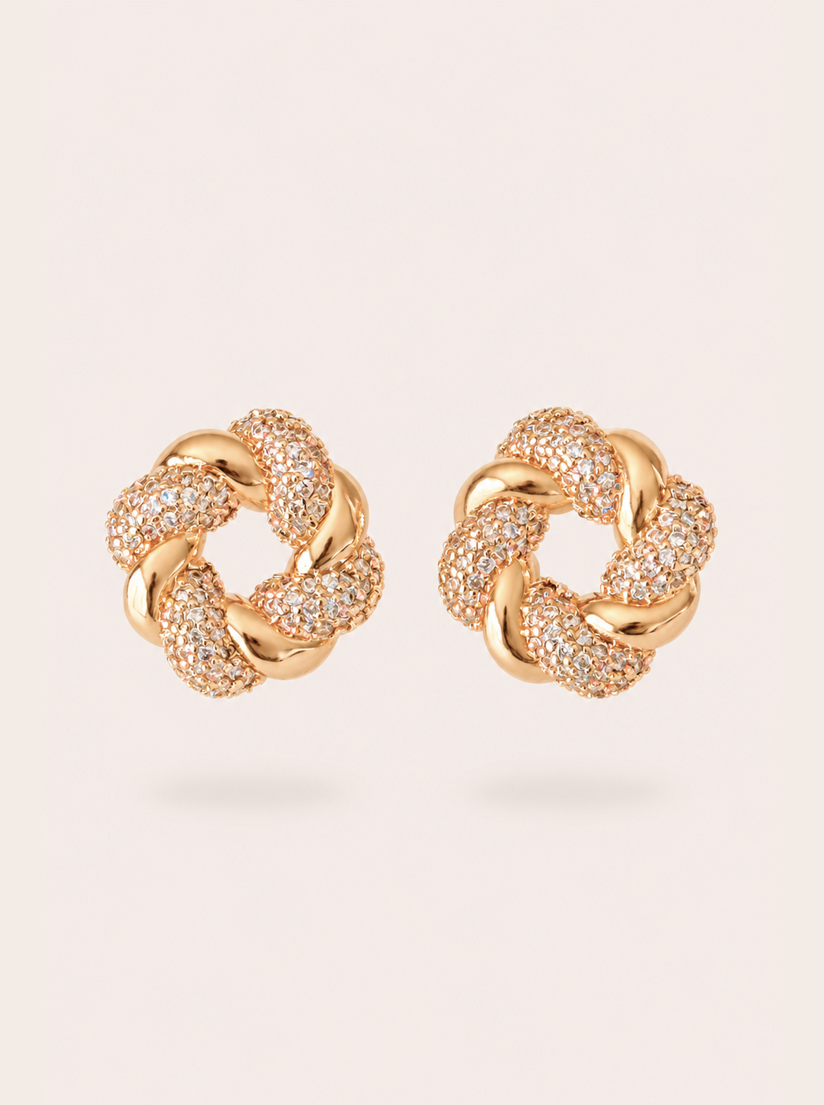 Cut crystal earrings with a woven 18k gold-plated finish, Croissant Earrings by Azulique.