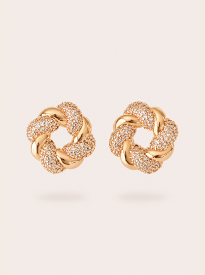 Cut crystal earrings with a woven 18k gold-plated finish, Croissant Earrings by Azulique.