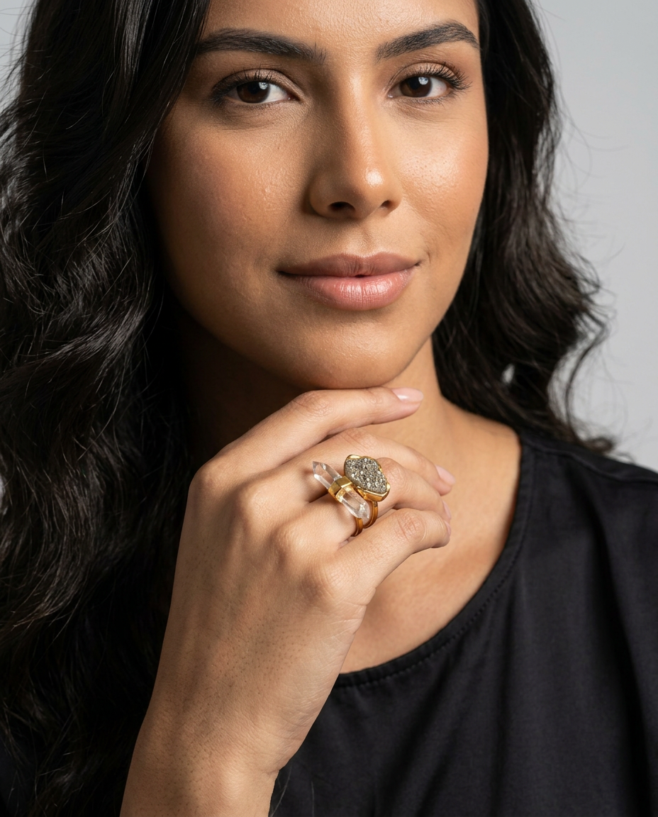 Woman wearing druzy and clear quartz statement ring with 18k gold-plated finish, Selva Line by Azulique.