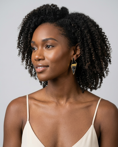 Model wearing  labradorite statement earrings with 18k gold-plated finish, Selva Line by Azulique.