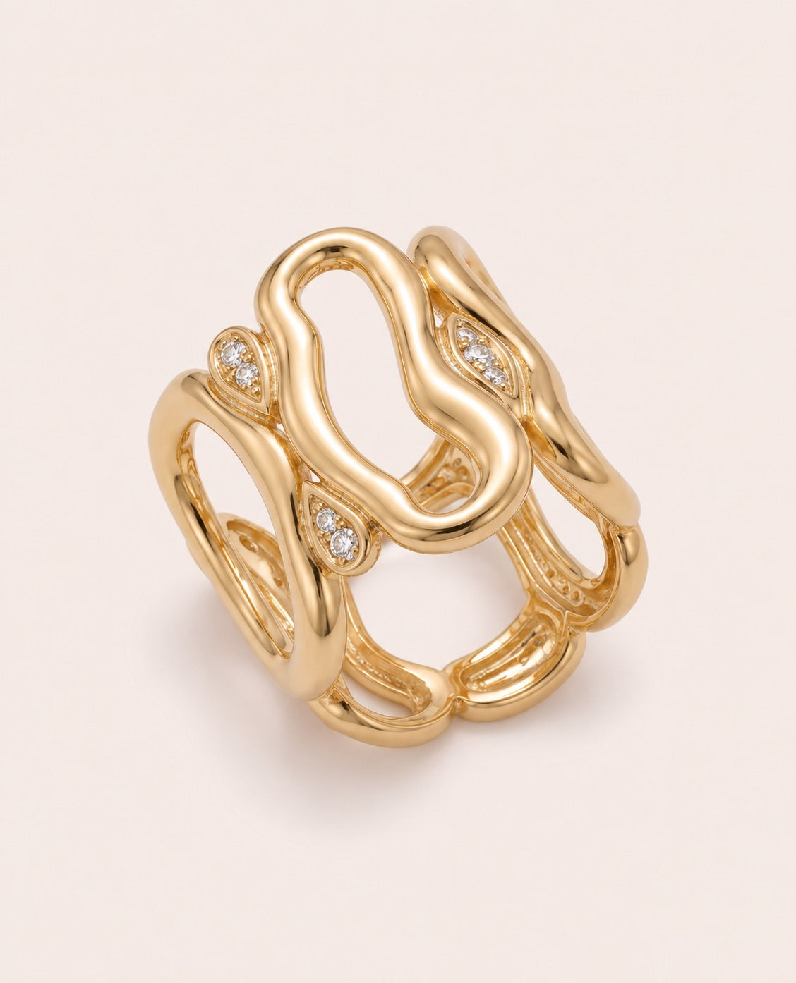 Gold wide openwork statement ring with curved loops and pavé crystal details
