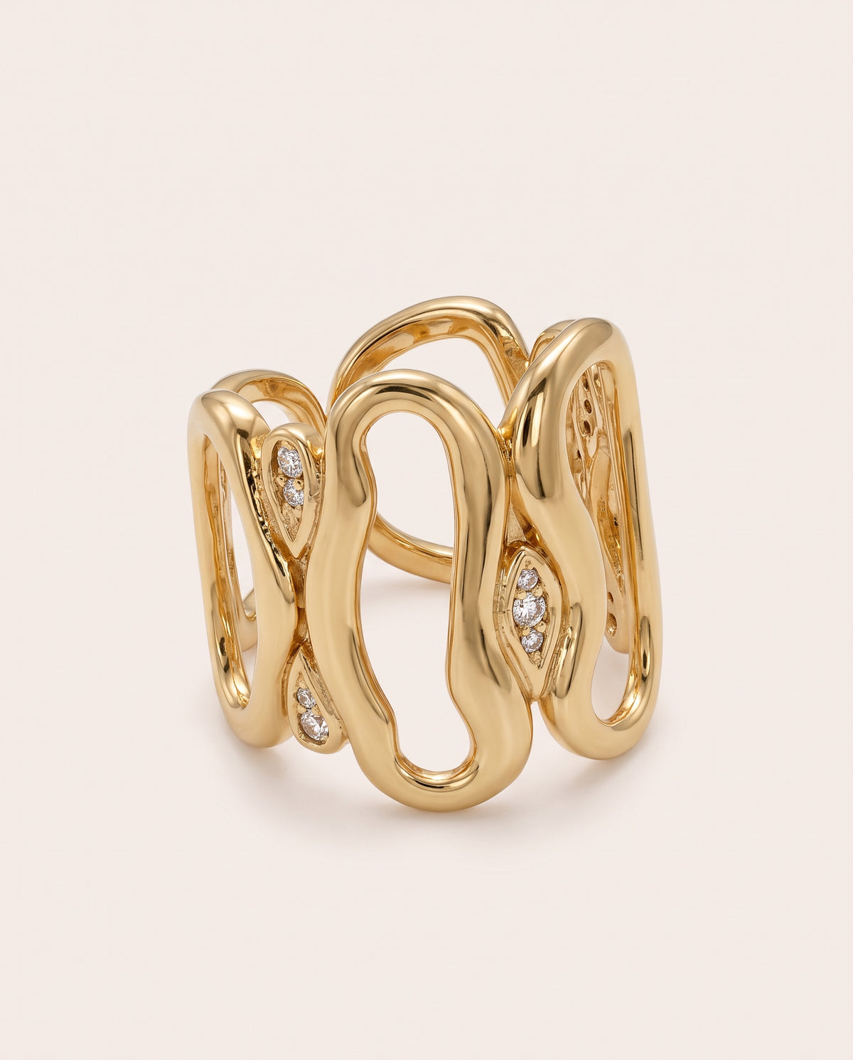 Gold wide openwork statement ring with curved loops and pavé crystal 