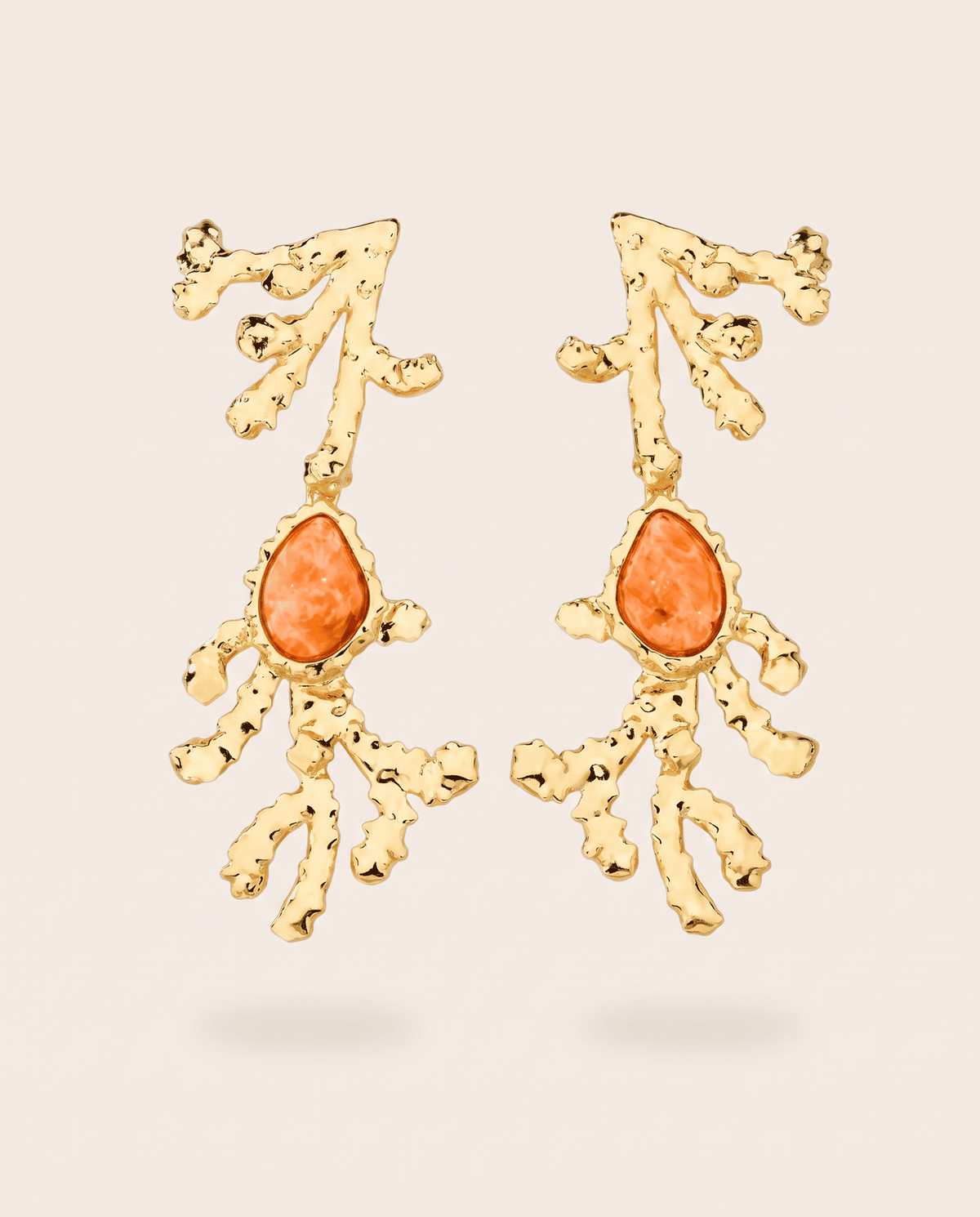 Orange calcite sculptural earrings with 18k gold-plated coral design, Selva Line by Azulique.

