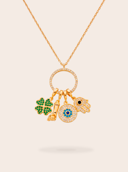 Gold plated Sorte lucky charm necklace with cubic zirconia figa, four leaf clover, evil eye and hamsa charms